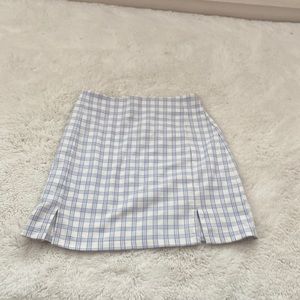 Blue and white checkered skirt.